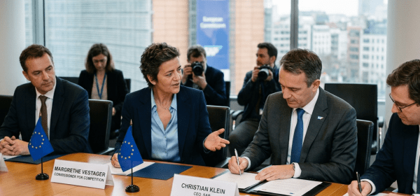 Margrethe Vestager and Christian Klein signing settlement agreement at meeting